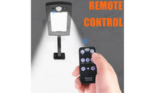 Load image into Gallery viewer, IP65 Waterproof Solar Wall Light 66 Lamp Beads Three Light Modes Remote Control